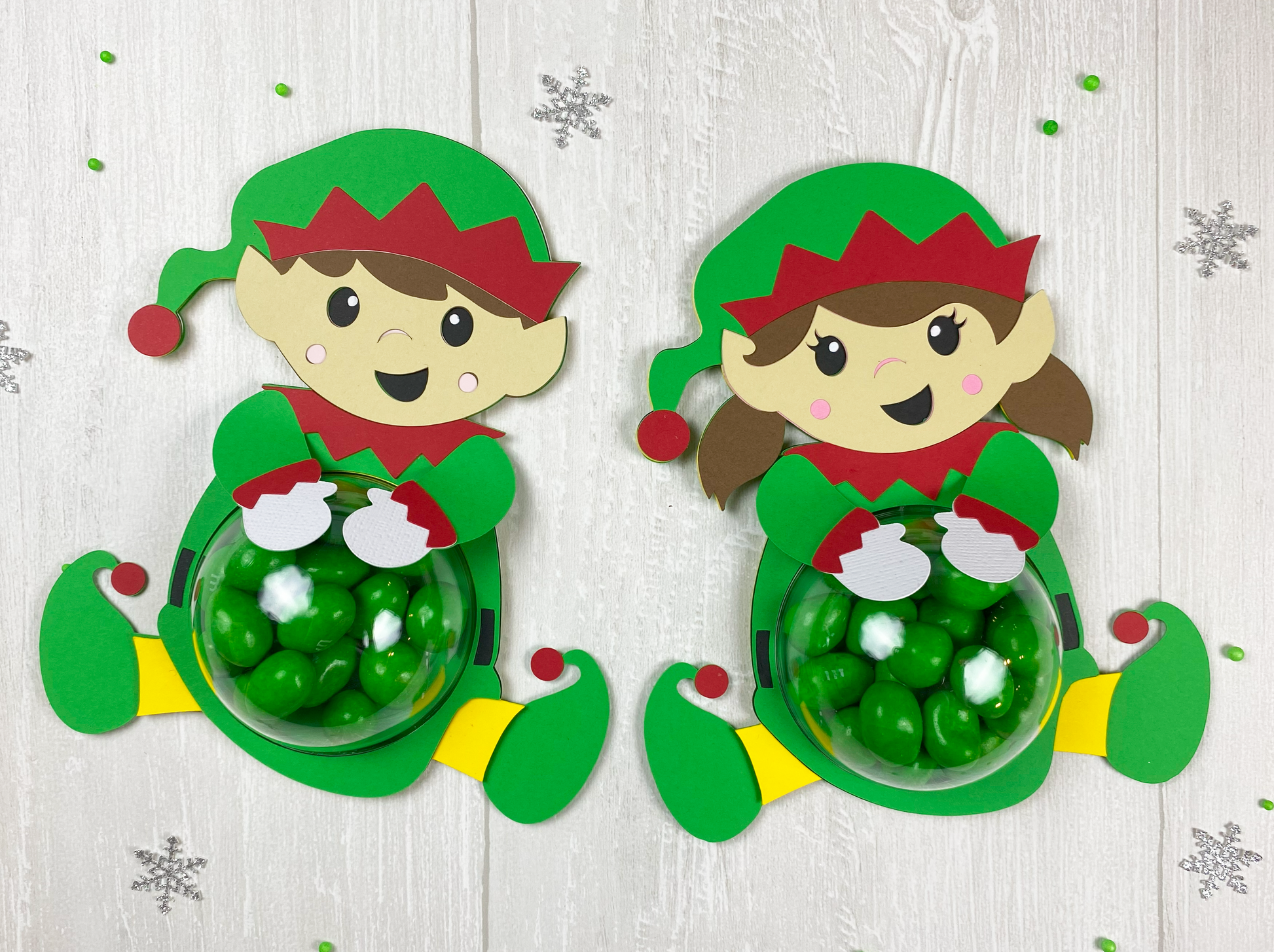 Boy and girl elf candy holders. Template for Cricut or Silhouette. Perfect stocking stuffers, holiday party favors or class gifts.